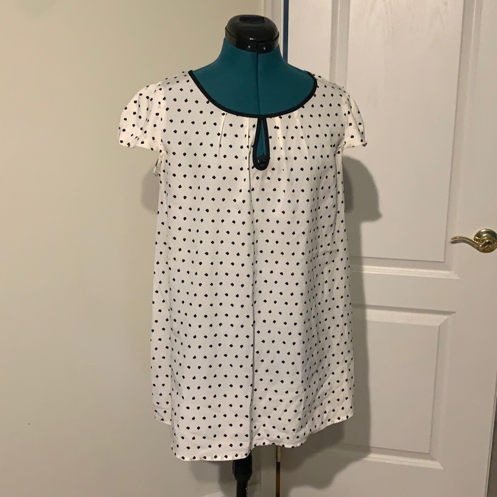 Polka dot maternity blouse from “Oh Baby” by Motherhood.